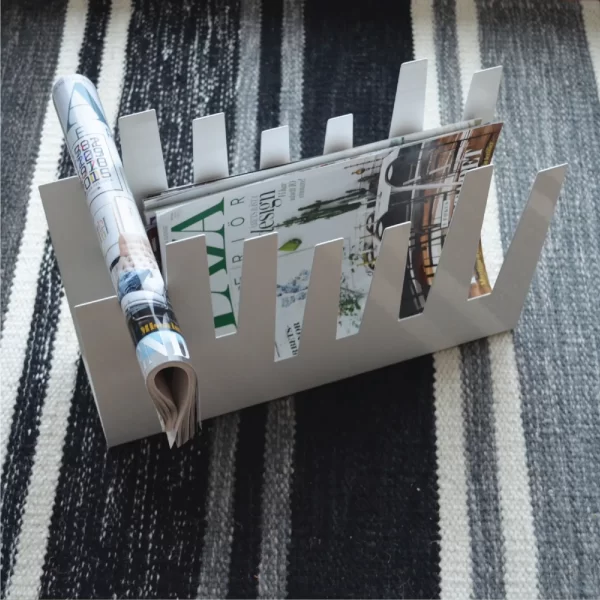 Žurnalų stovas. Žalias Šis itin stilingas ir praktiškas žurnalų stovas yra tikras dizaino pavyzdys.