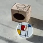 Bajo Spinning Top Mondrian — medinis vilkelis, vaizdas iš viršaus