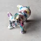 Dekoratyvinė figūrėlė „Splash Bulldog“ įkūnija žaismingą Pop Art stilių, paverčiant bet kokią erdvę gyvybingu reginiu.